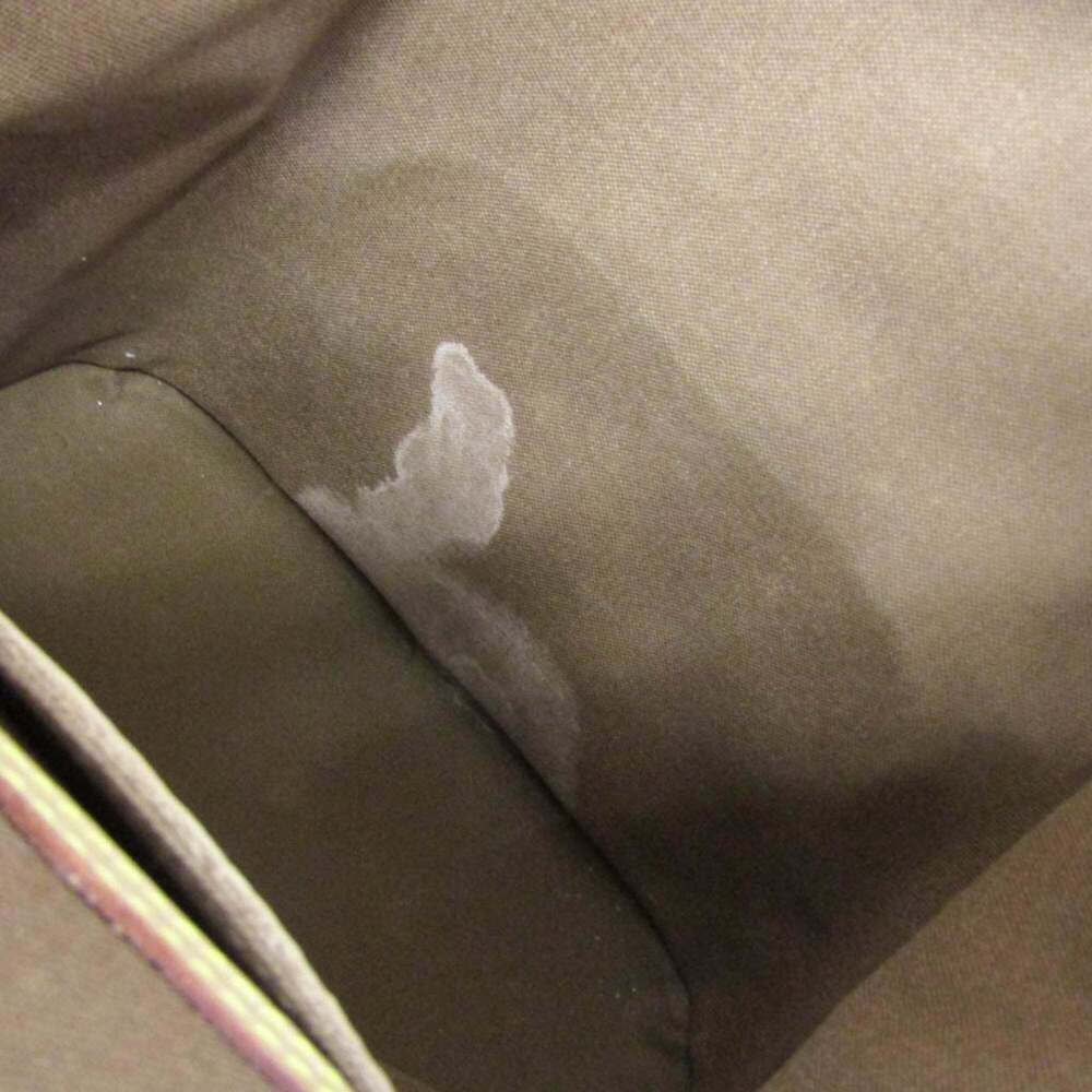 LOUIS VUITTON Brown Monogram Backpack - Picture 13 of 16